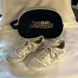 White athletic cheer shoes with Black Rebel Ruthless Bag